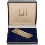 Silvered Dunhill lighter.