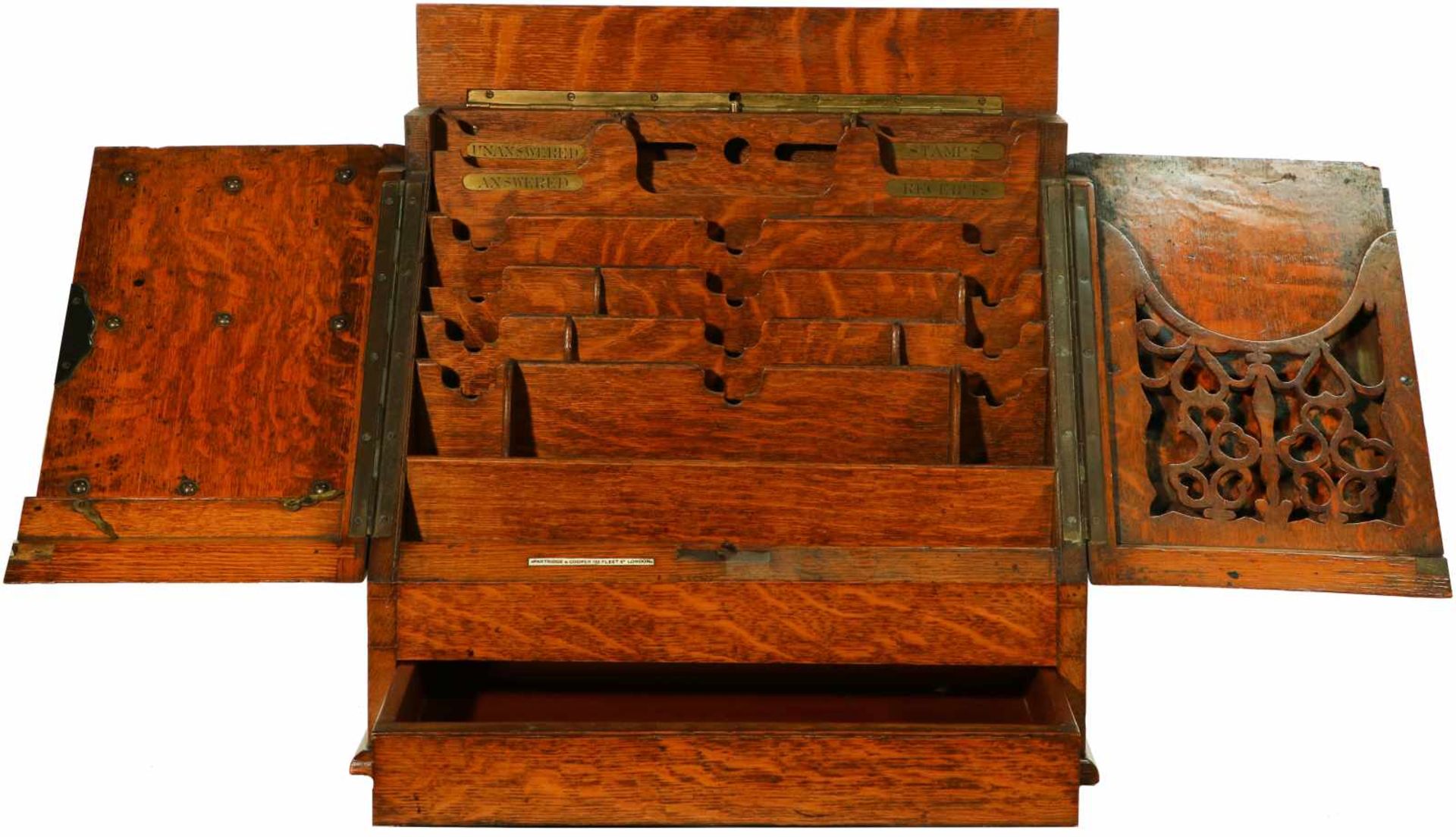 An oak 'Stationery Cabinet', Partridge & Cooper, 192 Fleet Street London. With secret compartment.