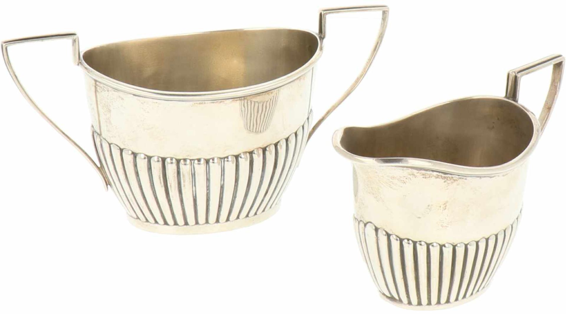 (2) Piece silver set of creamers.