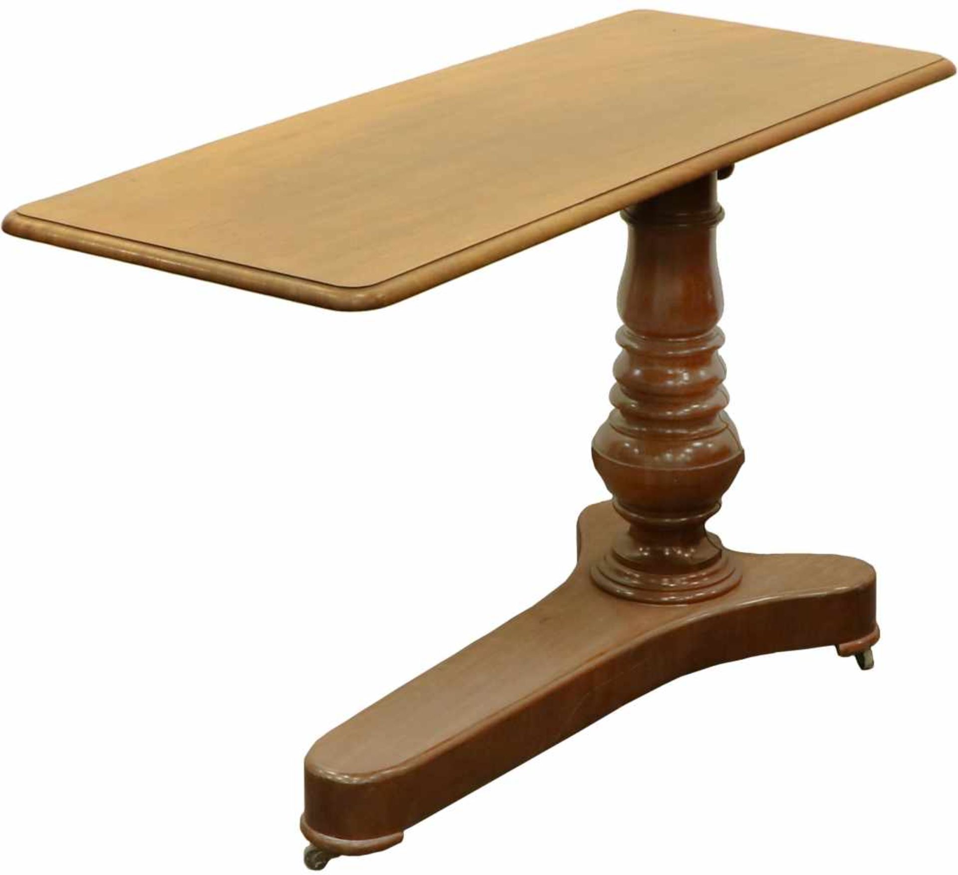 An adjustable mahogany table. England, 19th century.