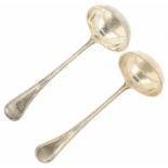 (2) Silver sauce spoons.