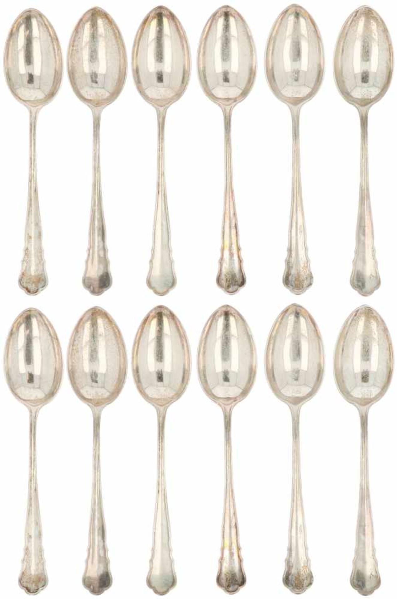 (12) Piece set of silver dessert spoons.