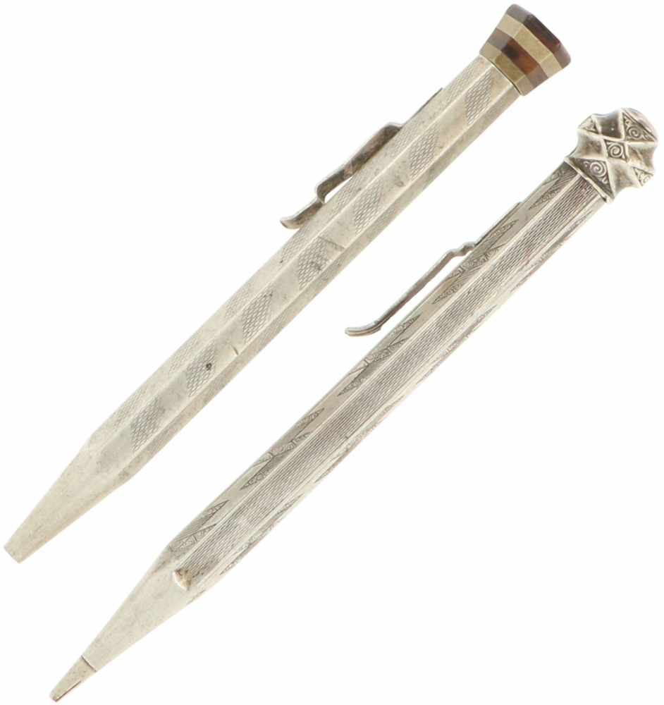 (2) Silver mechanical pencils.