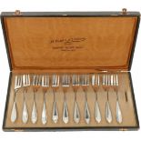 (11) Piece set of silver pie forks.