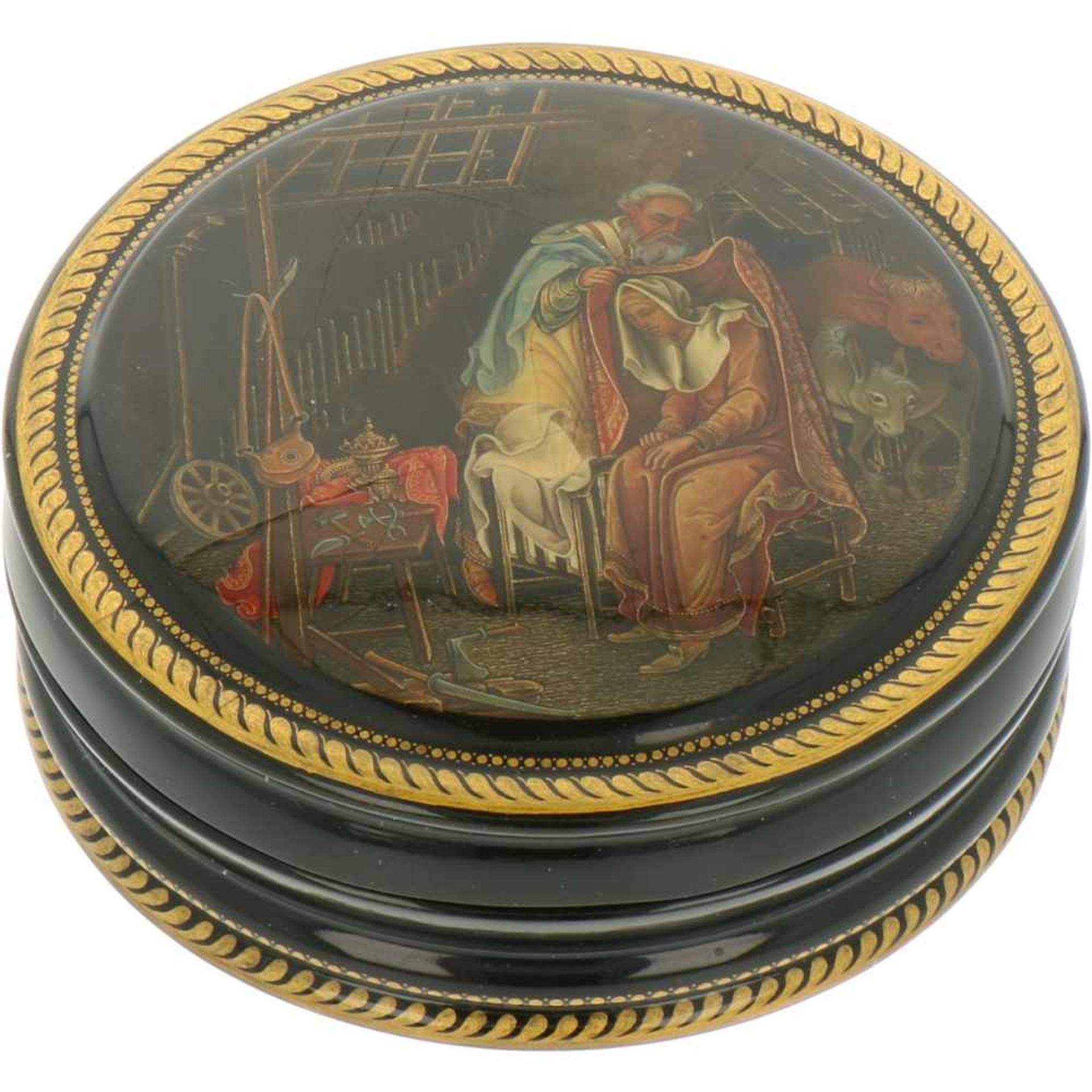 A round Russian lacquer box with depiciton of Navita.