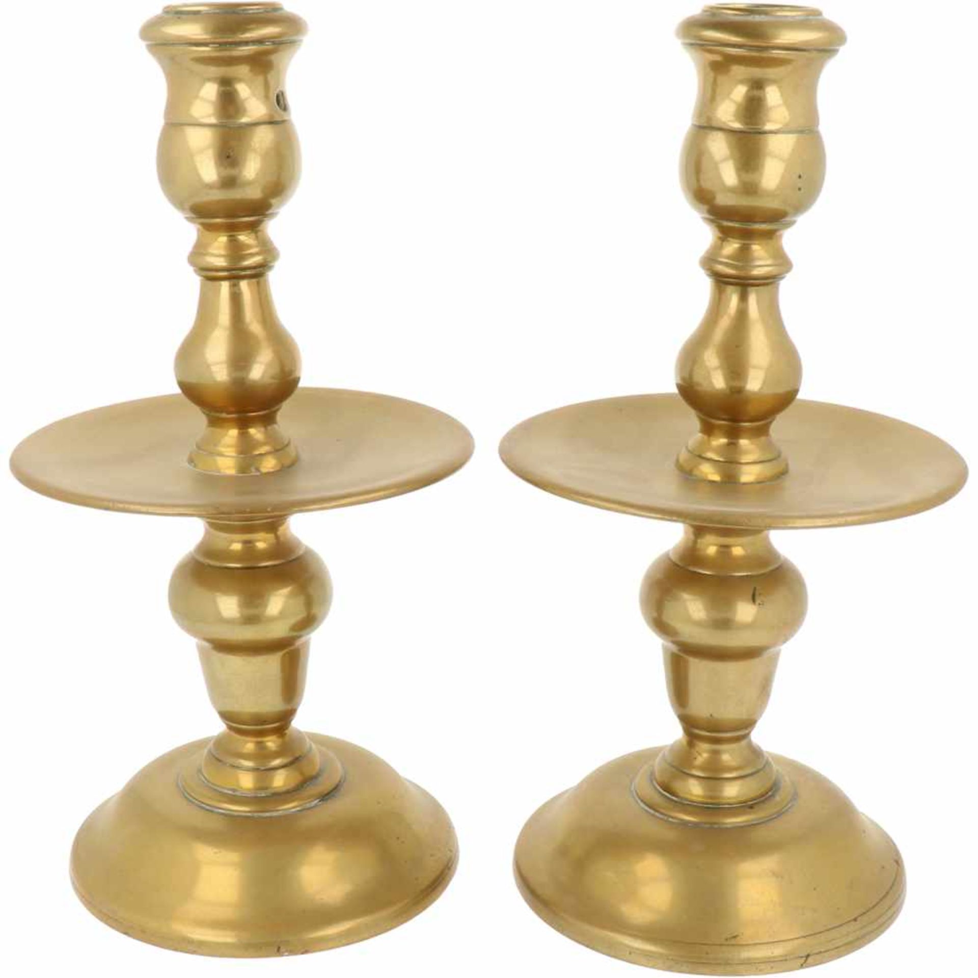 A set with (2) disc candles. Ca. 1800.