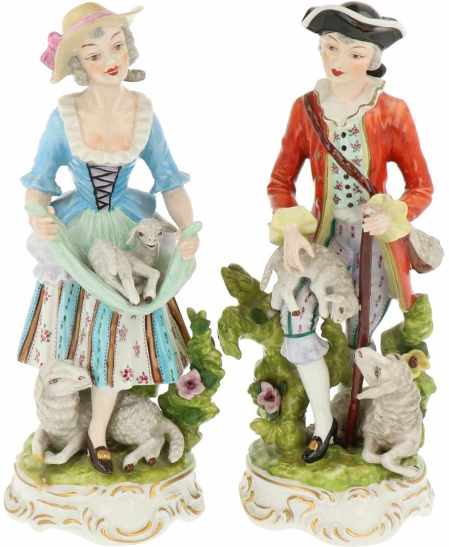 A set of procelain figurines of a lady and a gentleman with goats. Volkstedt-Rudolstadt, Germany.