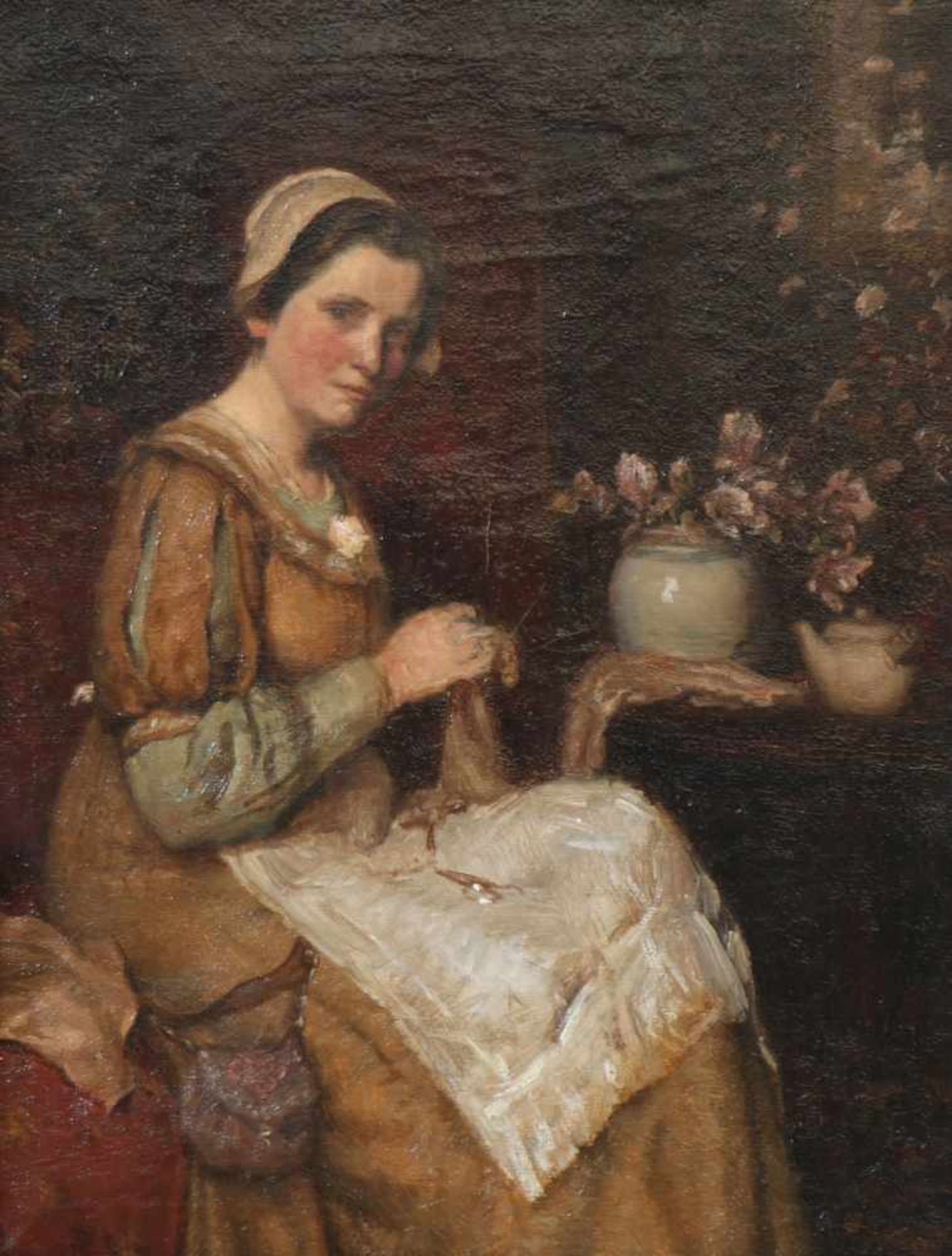 Hollandse School, ca. 1900.Een handwerkende dame in een interieur, olieverf op doek, ca. 1900.
