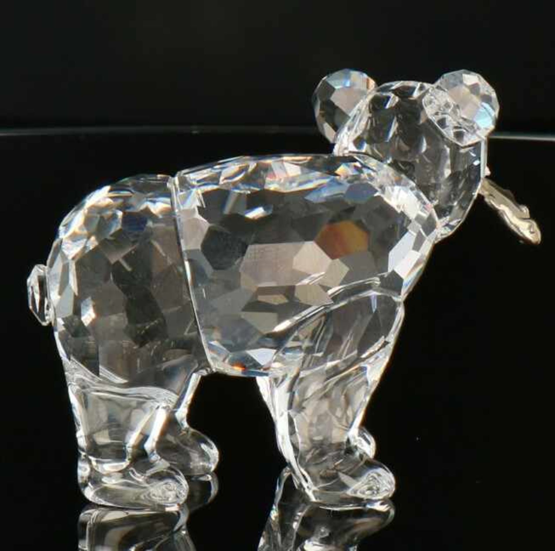 Swarovski Grizzly jong met zalm. - Bild 2 aus 3