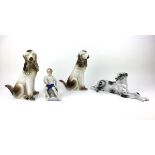 (Curiosa) Beelden porseleinLot porseleinen beelden drie honden en een kind, tweede helft 20e ee