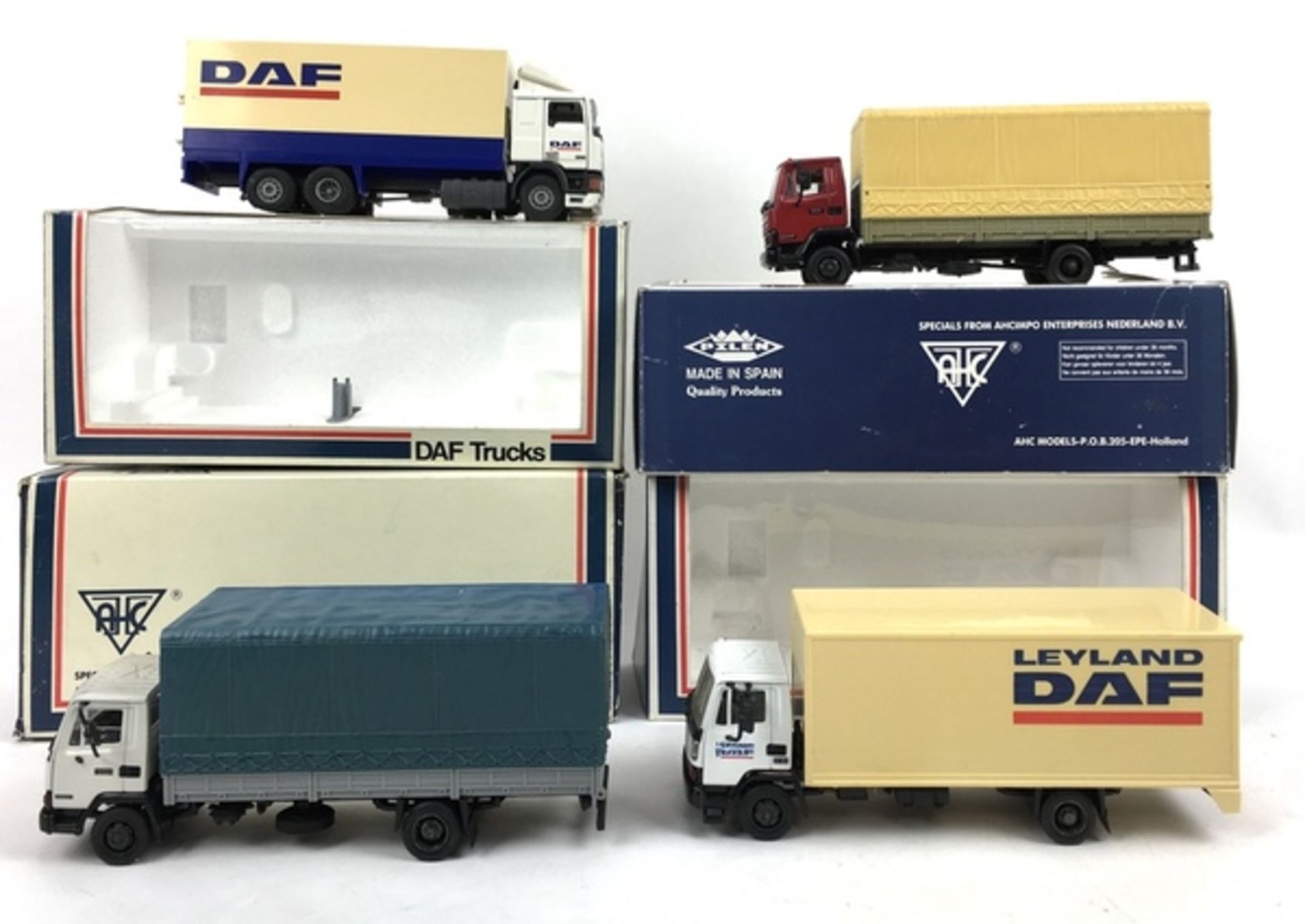 (Speelgoed) Vrachtwagens DAF, AHC modelsVier vrachtwagens DAF, AHC models. Conditie: In goede s