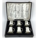 (Zilver) Zilver, glas. Een set van 6 borrel glazen van Cooke & Kelvey in doos, midden 20e eeuw.