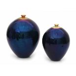 Mobach, UtrechtTwo lustreglazed ceramic vases in blue with gold-coloured necks, in two heights,
