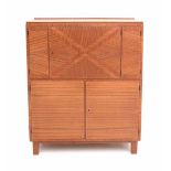 Midcentury ModernA teak veneered sideboard with several compartments to be opened with cupboard