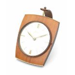 HaidA teak and brass wall clock, circa 1960, marked to the dial, battery driven.25 cm. h.