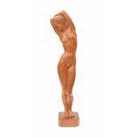 Willy Kreitz (1903-1982)A carved fruitwood sculpture of a female nude, the hands above her head,