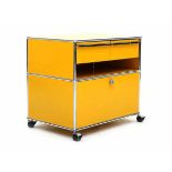 USM HallerA yellow lacquered metal and chromium plated trolley with drawers, modular system, no
