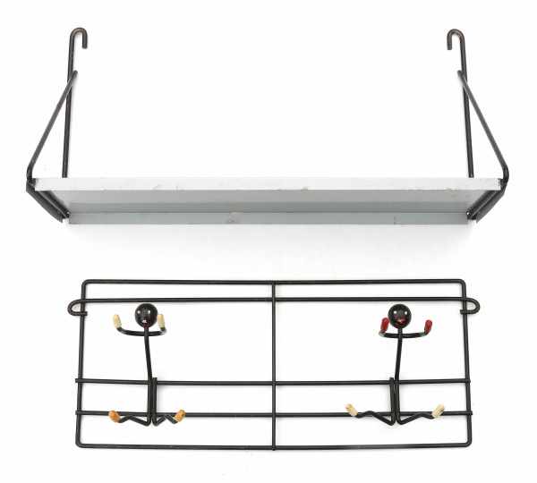 Midcentury ModernA black lacquered wire steel small coat rack with human figures together with a