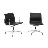 Charles & Ray EamesTwo black leather upholstered EA 108 Aluminium Chairs, produced by Vitra,
