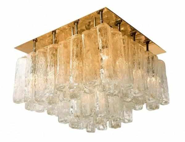 Julius Theodor Kalmar (1884-1968)A brass and molded glass sixteen light "Granada" ceiling lamp,