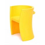 Eero Aarnio (1932)A yellow plastic multi purpose child's (rocking) chair, from the Metoo collection,