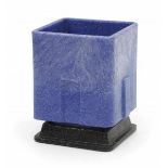 A.D. Copier (1901-1991)A tall square section blue 'graniver' glass flowerpot on black stand,