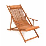 Midcentury ModernA Japanese bamboo deck chair with armrests, made of bamboo slats, foldable and