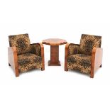 Art DecoA pair of walnut veneered lounge chairs with an occasional table, the chairs upholstered