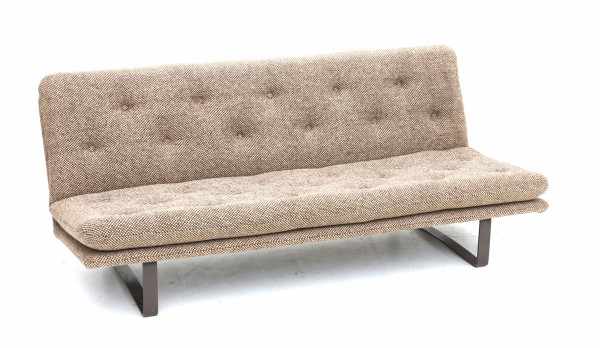 Kho Liang Ie (1927-1975)A brown upholstered sofa, model C684, the metal frame lacquered in brown,