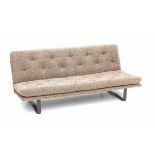 Kho Liang Ie (1927-1975)A brown upholstered sofa, model C684, the metal frame lacquered in brown,