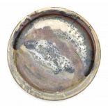 Gerburg Karthausen & Ingeborg ZenkerA stoneware dish with dripglazes, produced in the communal