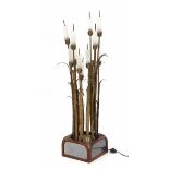 Hollywood RegencyA brass and frosted glass floorlamp shaped as bulrush, on partly wooden base.134
