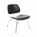 Charles and Ray EamesA black lacquered bent plywood and chromium plated metal "Lounge Chair