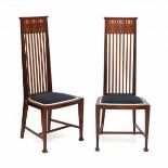 Arts & CraftsTwo mahogany high-back side chairs, the top of the backrest inlaid with repeating