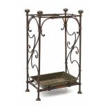 JugendstilA copper and metal umbrella stand with drain basin, decorated with whiplash forms, circa