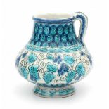 De Porceleyne Fles, DelftA Persian-inspired decorated ceramic vase with handle, circa 1910-1930,