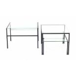 Midcentury ModernA pair of black lacquered metal occasional tables, both with two glass panes with