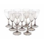 A.D. Copier (1901-1991)Nine times 'wijnglas klein' (small wineglasses), grey-violet glass with cut