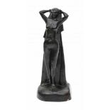 Willem Coenraad Brouwer (1877-1933)A black glazed ceramic figure 'Uit 't Bad', produced by Fabriek