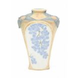 Louis Lourioux, FranceA partly glazed moulded porcelain vase decorated with Art Nouveau floral
