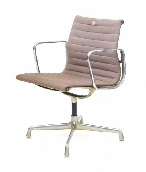 Charles & Ray EamesAn aluminium revolving chair with armrests, model EA 108, produced by Herman