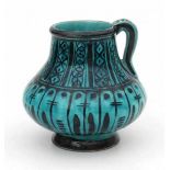 De Porceleyne Fles, DelftA Persian-inspired decorated ceramic vase with handle, green glazed,