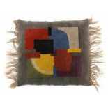 Jan Gompertz (1887-1963)A hand woven cushion with colourful abstract geometrical pattern on a grey