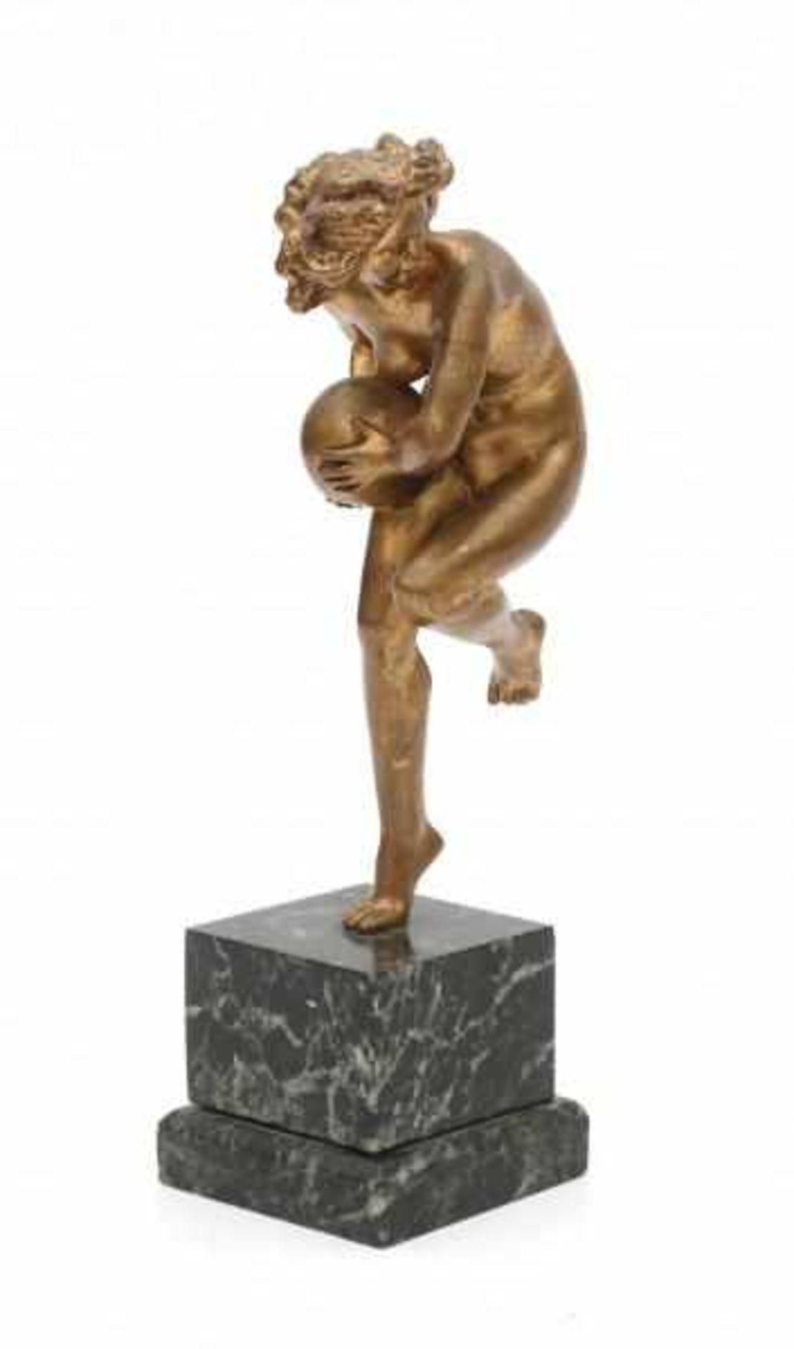 Leonildo Giannoni Chapelier (1880-1951)A gilt metal sculpture of a female nude with a ball, on green