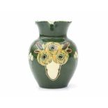 Baron, BarnstapleAn Art Nouveau ceramic vase decorated with repeating stylized floral pattern,