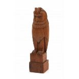 Amsterdamse SchoolA carved oak sculpture of a stylized owl, possibly a stair post figure, signed FR.