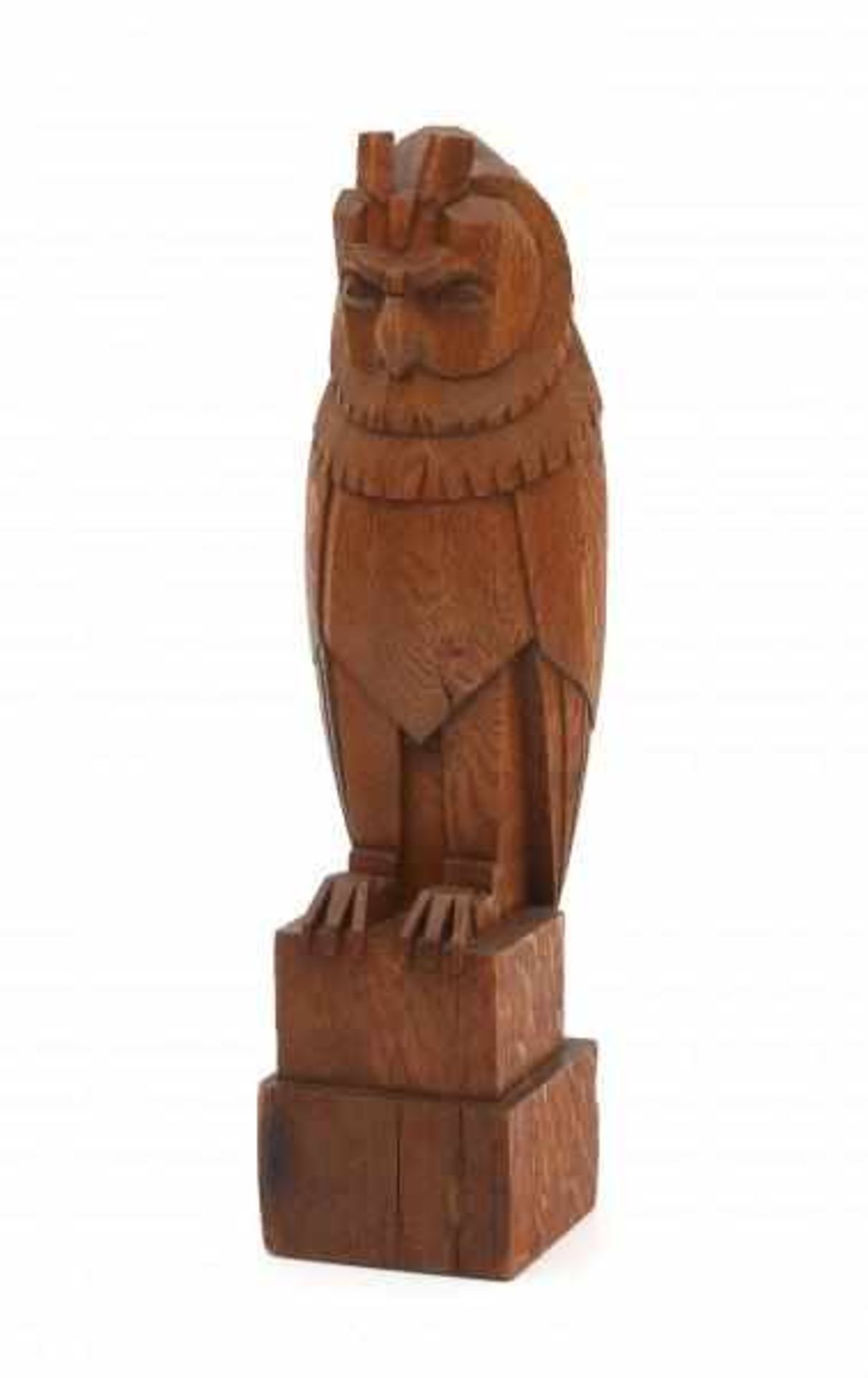 Amsterdamse SchoolA carved oak sculpture of a stylized owl, possibly a stair post figure, signed FR.