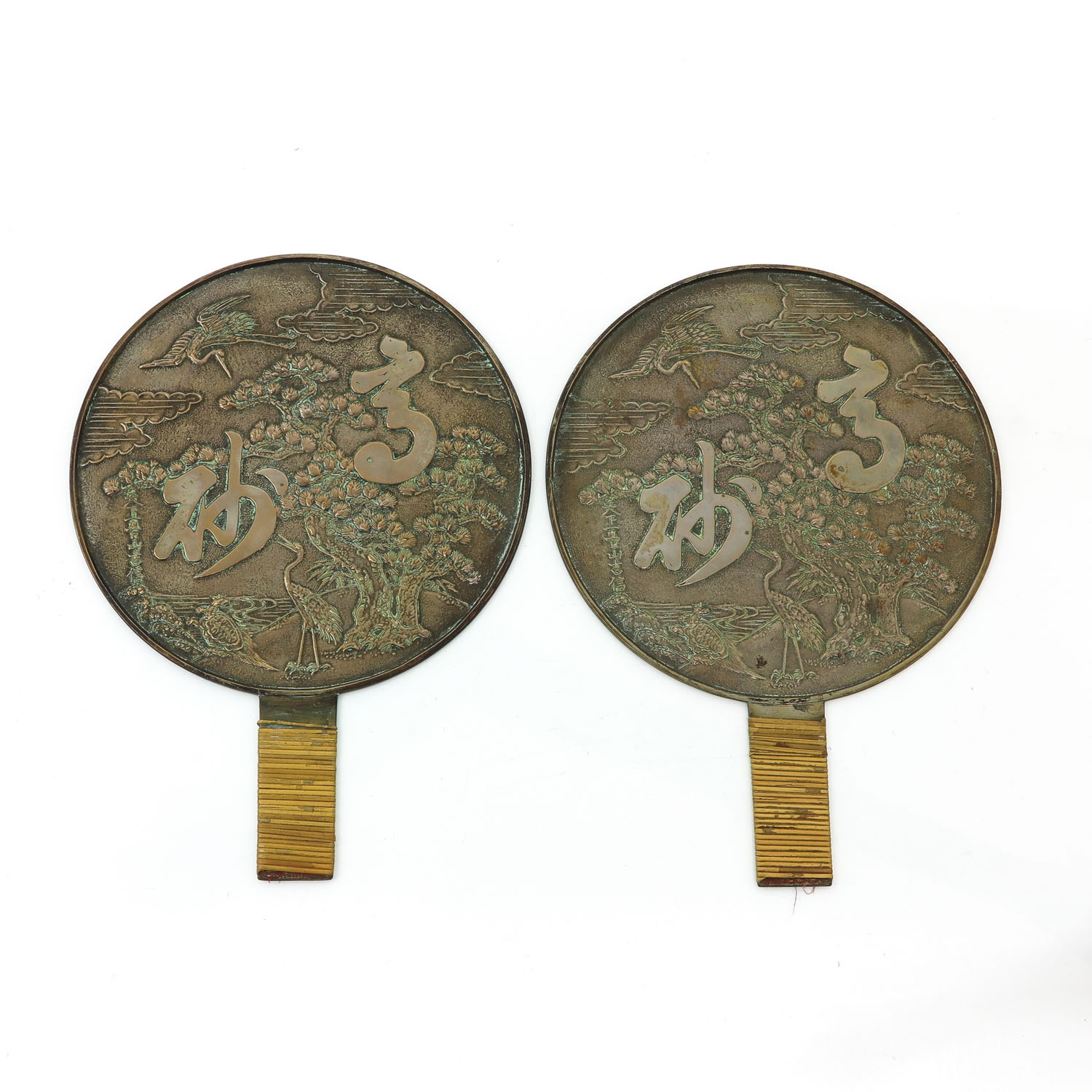 A Pair of Bronze Mirrors