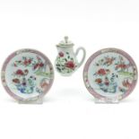 Two Batavianware Saucers and Creamer