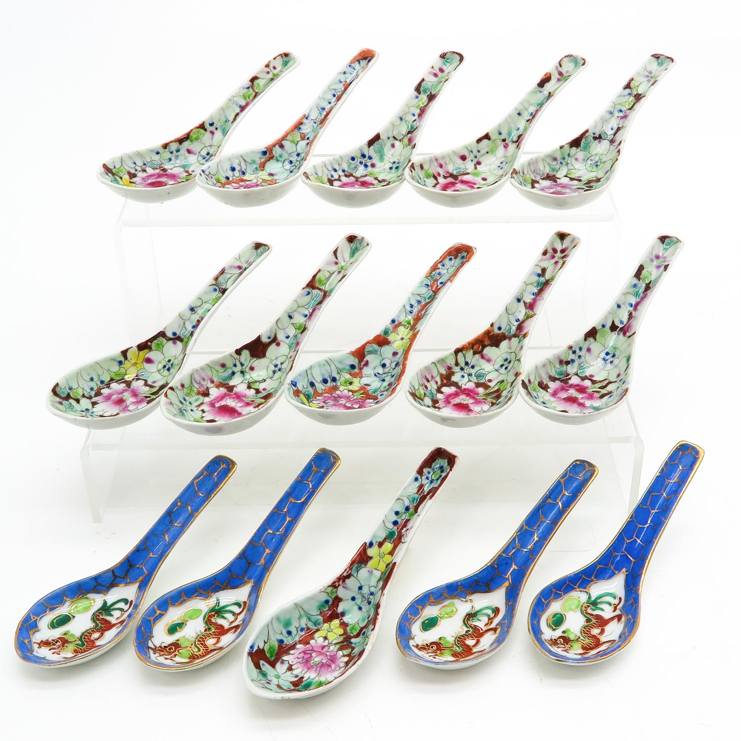 A Collection of 15 Porcelain Spoons